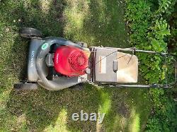 Honda self-propelled lawn mower-Harmony II HRR-216, Quadra Cut System. 5.5 HP