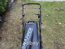 Snapper Big Six mower with electric start, self-propelled with bagger